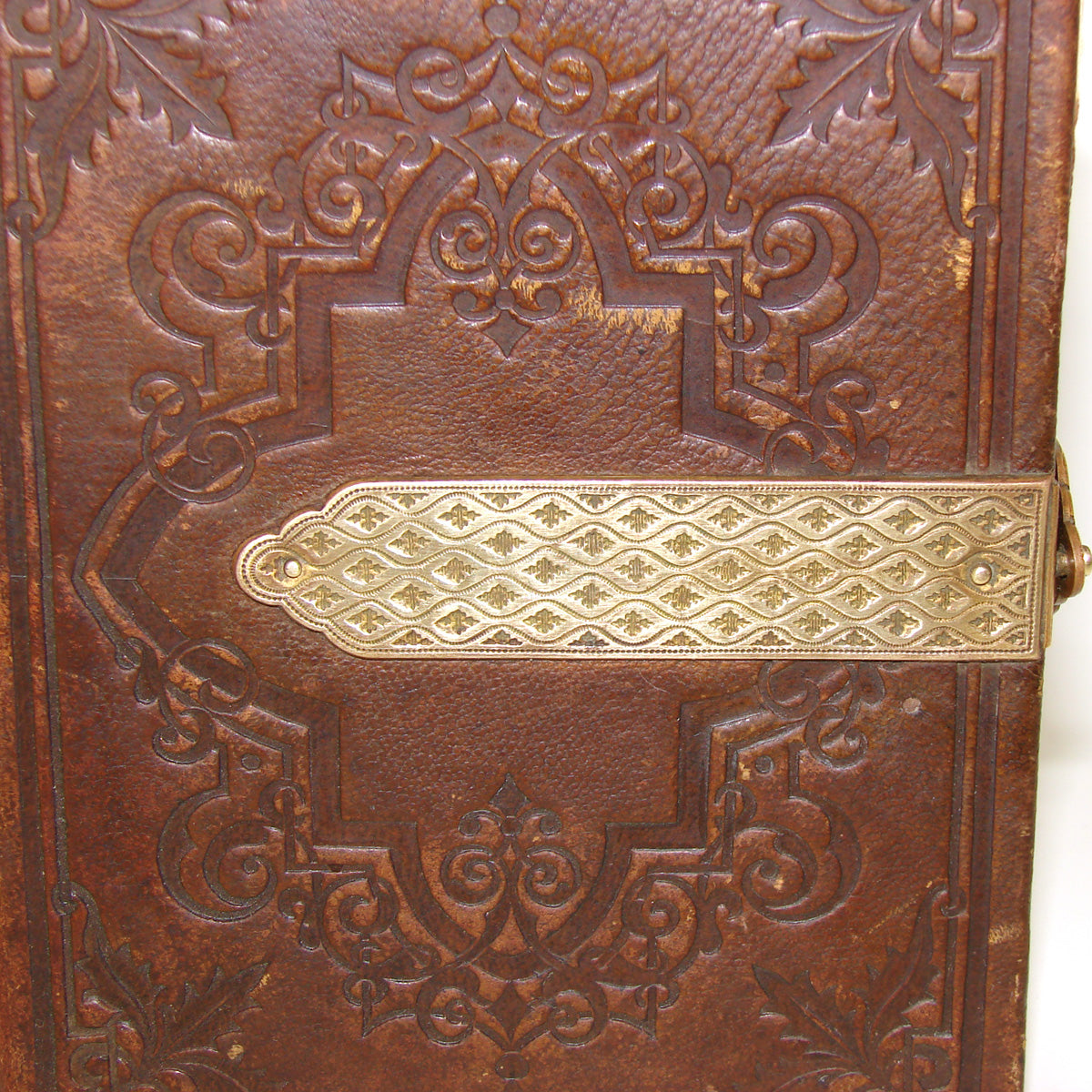 Antique Victorian Era Tooled Leather Carte d’Visite or Photo Album, Bronze Strap Clasp