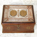 Antique French "Servan" Marked Gilt Embossed Leather Jewelry Box with Engraved Top & Figural Medallions