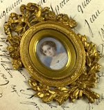 Elegant Antique French Portrait Miniature of a Child, a Girl of 7-8 Years, Elaborate Dore Bronze Frame